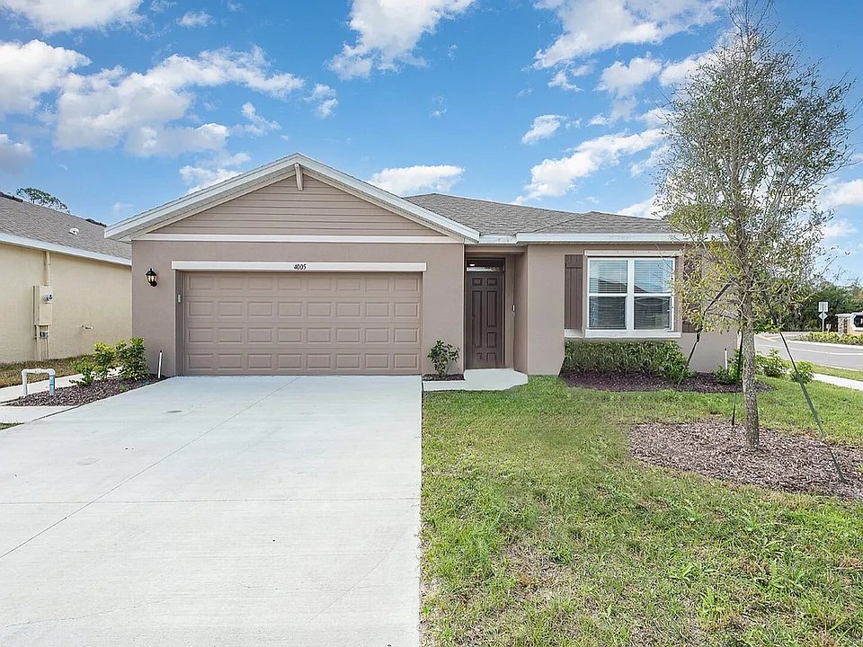 Charming single-story home with a spacious garage.