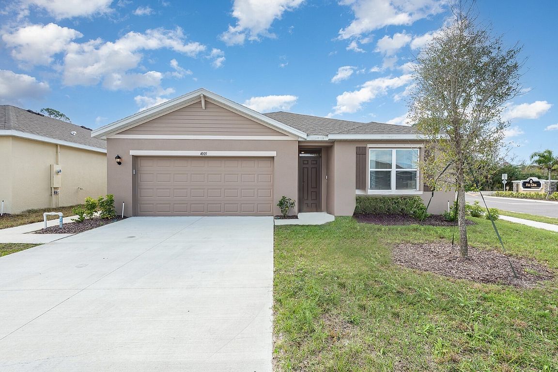 Charming single-story home with a spacious garage.