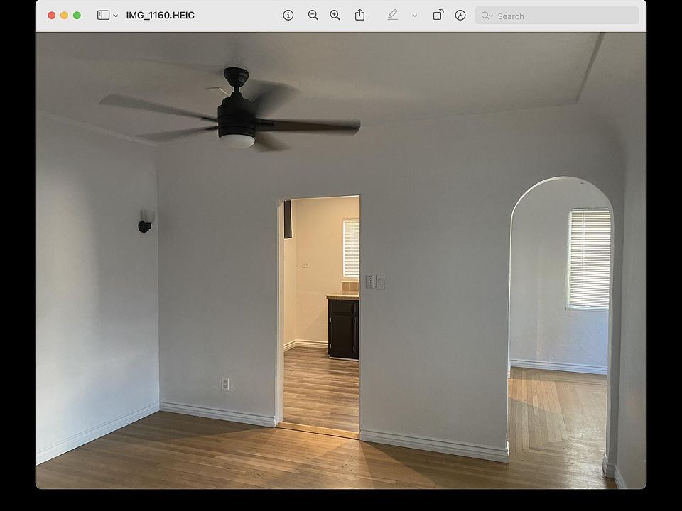Dining Rm., looking into breakfast nook and kitchen