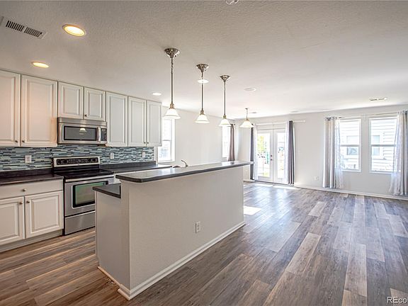 2nd image of 18731 E 58th Avenue #A