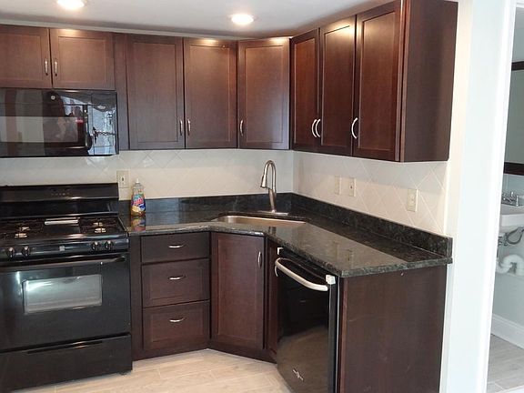 Granite countertops, microwave, Dishwasher, Disposal.