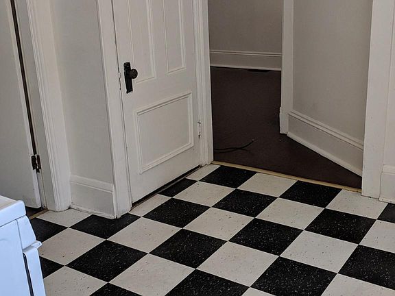 Kitchen into living room with basement access