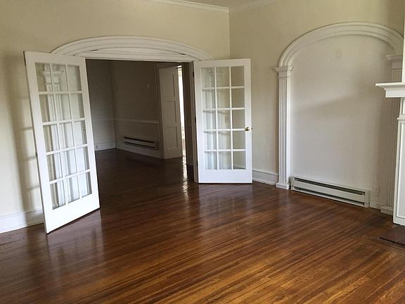 Large living room with lots of natural light.