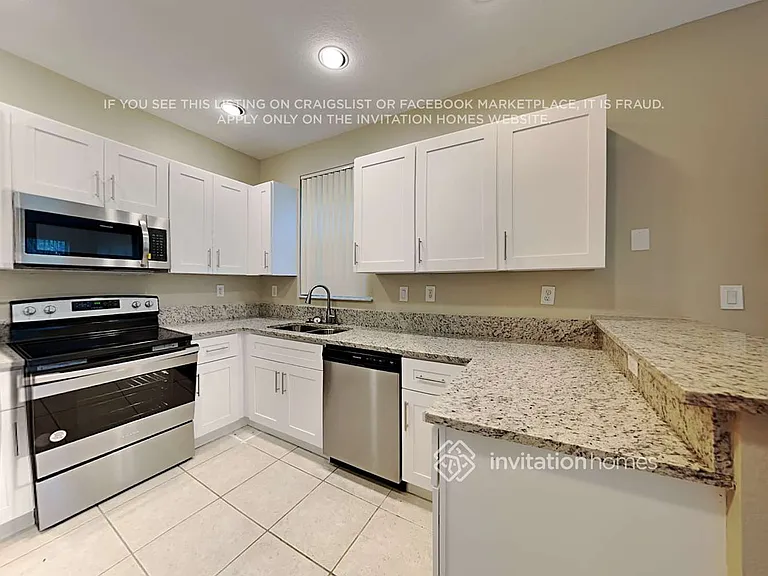 703 NW 170th Ter — Photo 8