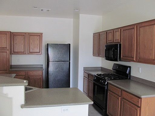 4th image of 9440 Victory Garden Ave