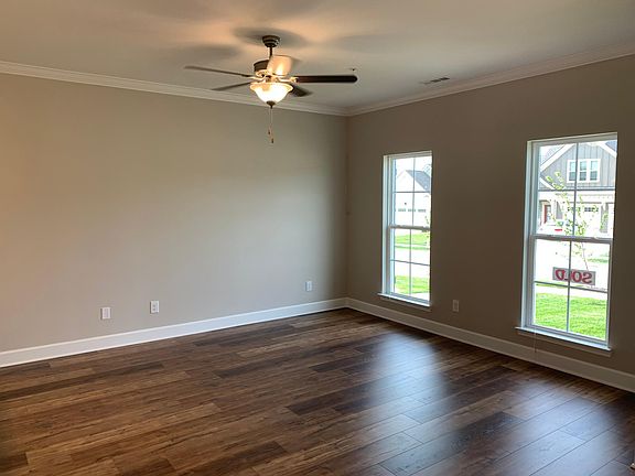 Large family room area with plenty of natural light.