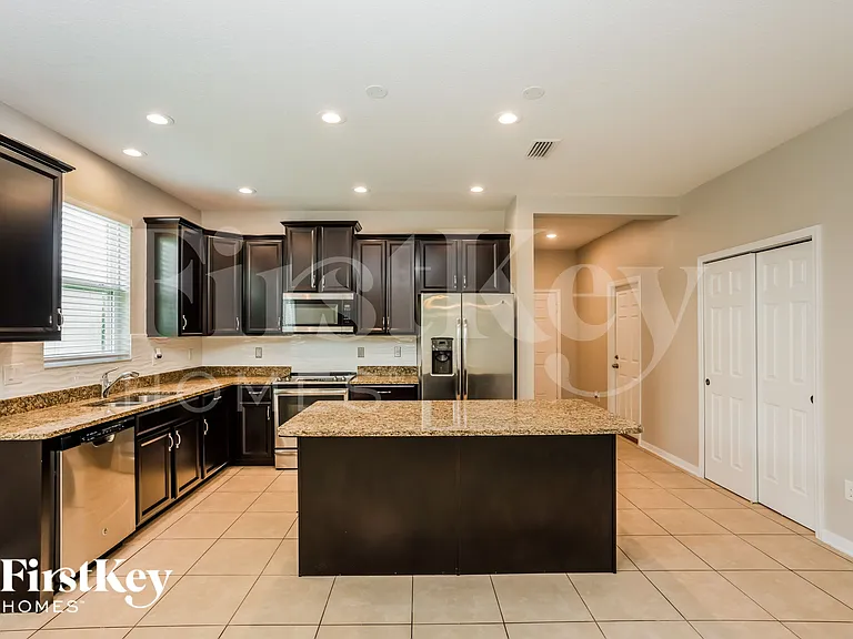 7719 E 110th Ave — Photo 3