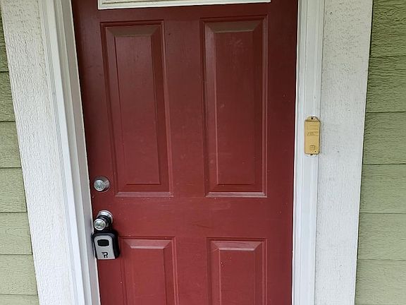 Front Door to house with little porch