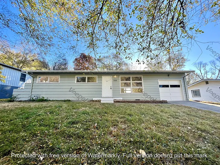 7009 NW Avalon St — Photo 5