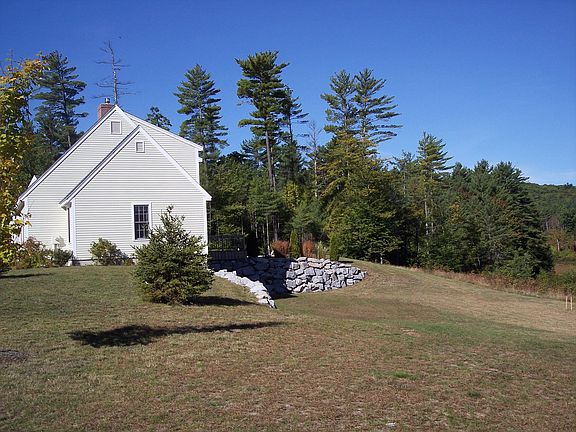 Driveway side of property