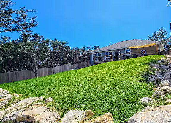 Large, fenced in back yard.