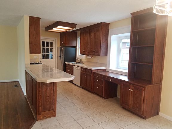 Sunny kitchen has ample storage