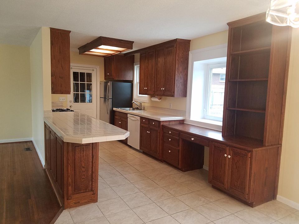 Sunny kitchen has ample storage