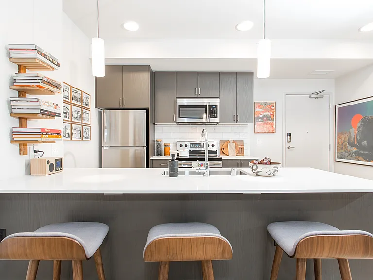 A stylish kitchen with a spacious island_perfect for cooking, dining, or working from home.