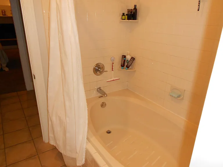 Large tub/shower in master bath.