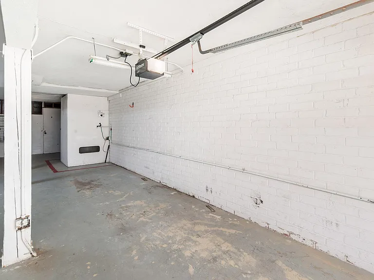 One car garage. Its a petite space for a small sedan.