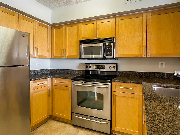 Kitchen with Granite Countertops and Stainless Steel Appliances