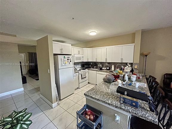 4th image of 6940 NW 179th St APT 308-7