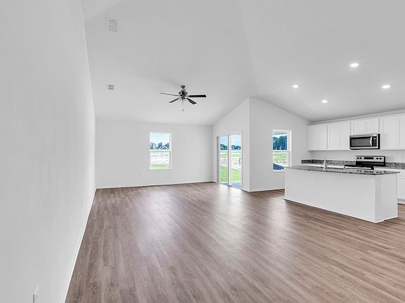 The open concept floor plan makes for the perfect place to entertain family and friends