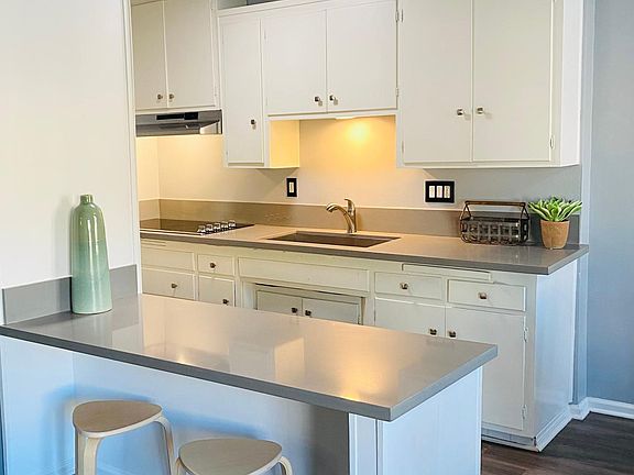 Spacious kitchen with LED lighting.