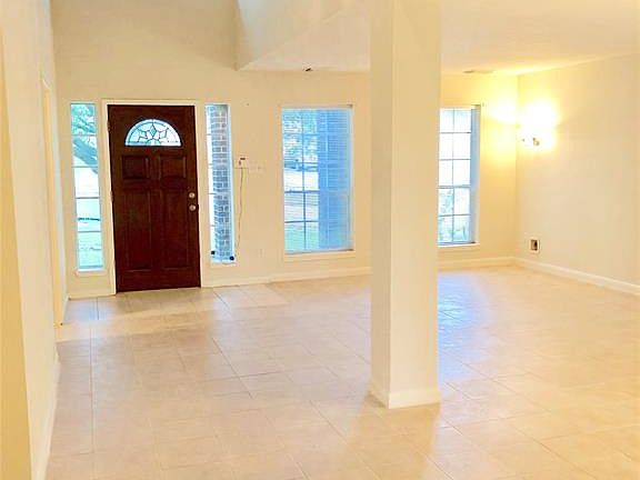 Inside the home looking back at the entry and double formal area