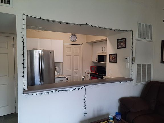 5th image of 5144 City St APT 228