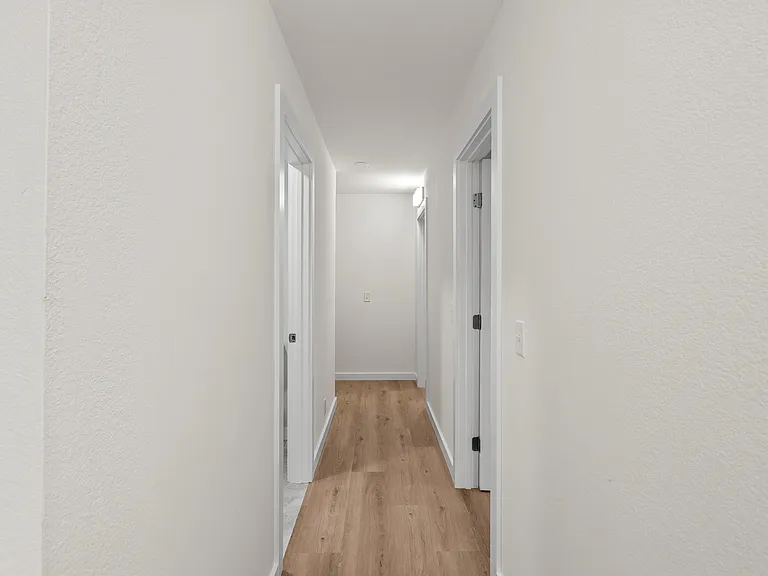 Hallway to 2nd and 3rd bedrooms