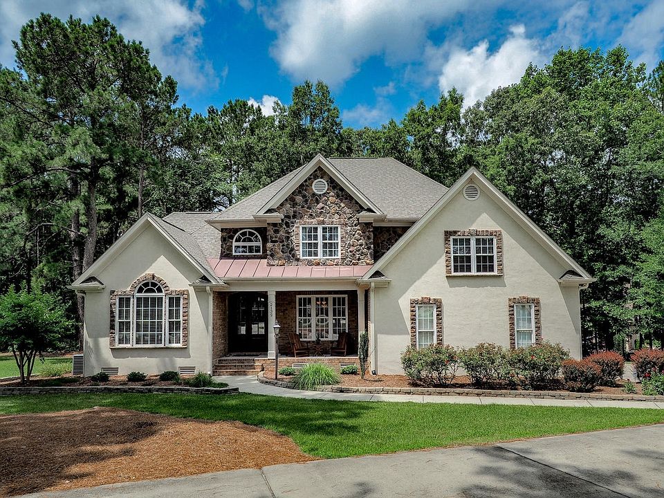 Front with circle driveway 