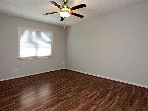 Third large bedroom with ample closet space and laminate flooring