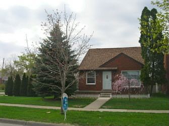 Corner Fenced Lot with mature trees