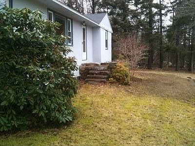 Charming well kept stucco home.