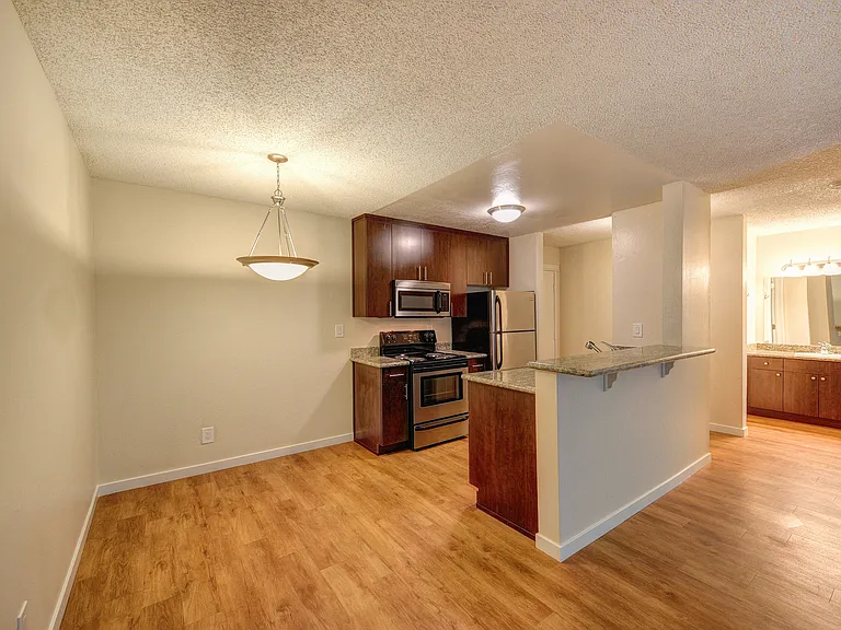 Dining Area with Hardwood Inspired Floors
