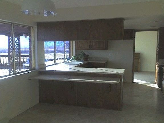 kitchen and kitchenette with wet bar