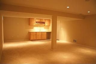 Wet bar and 1/2 bath in basement.