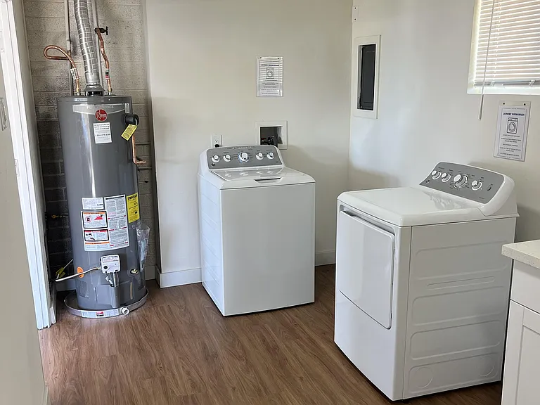 Laundry located via carport