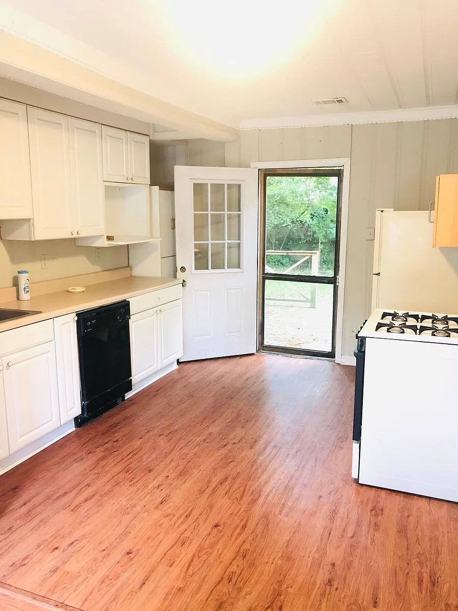 Spacious kitchen with 2 pantries, custom cabinets, all appliances-leads to great deck - 3647 Poplar Ave