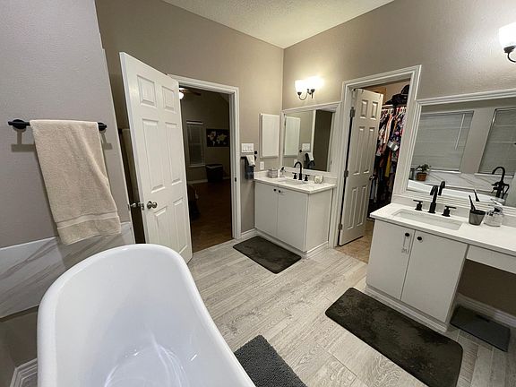 Master bathroom with walk-in closet