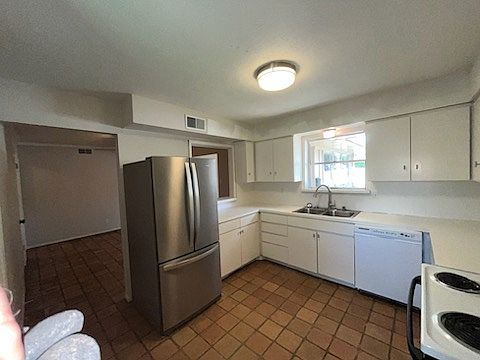 Freshly painted cabinets, SS, 3 door refrigerator, freezer