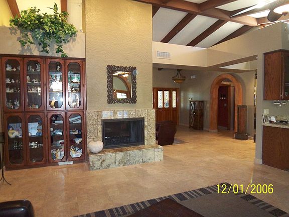 View from family room towards front door.  Dual fireplace.
