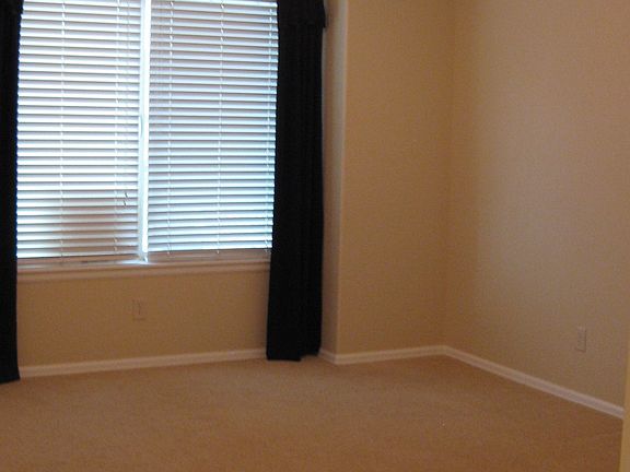 Master bedroom with vaulted ceiling