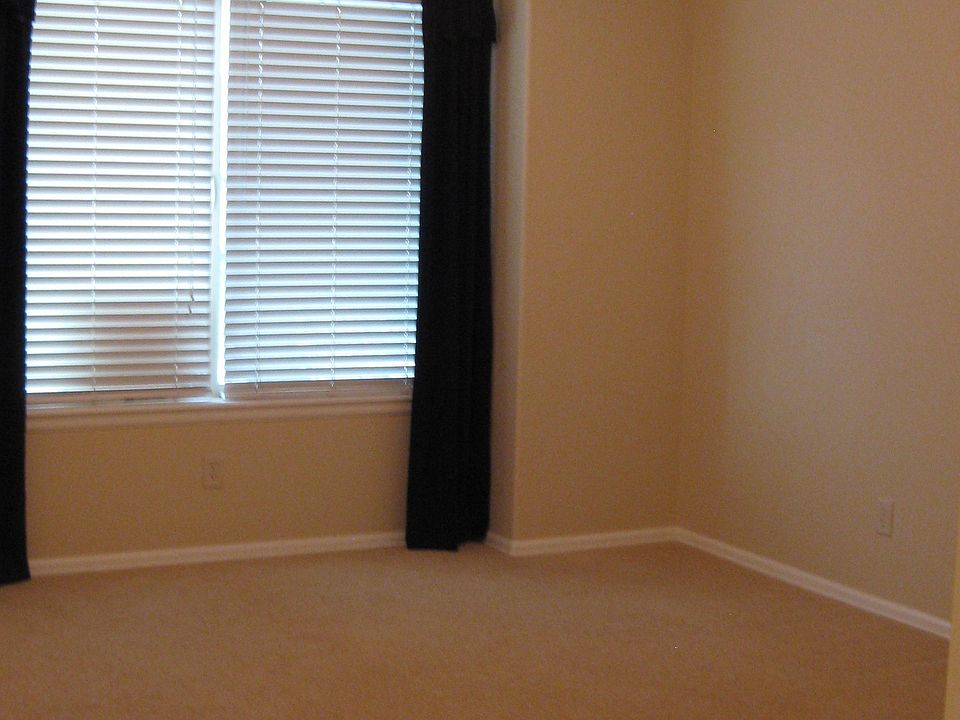 Master bedroom with vaulted ceiling