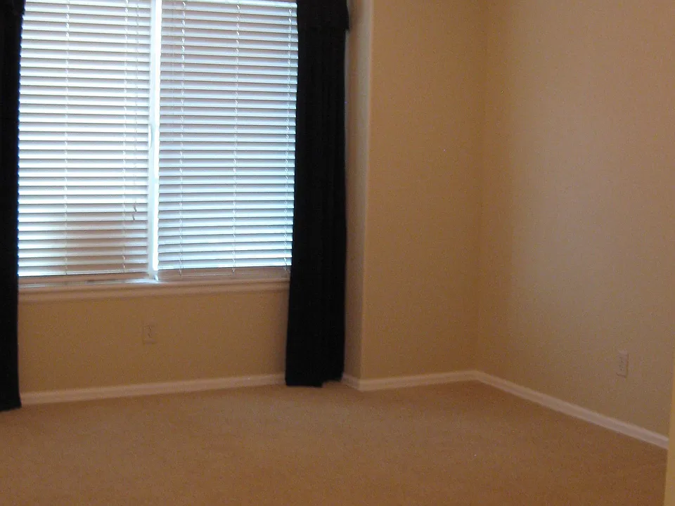 Master bedroom with vaulted ceiling
