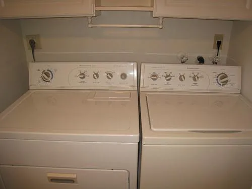 Full size washer and dryer inside unit