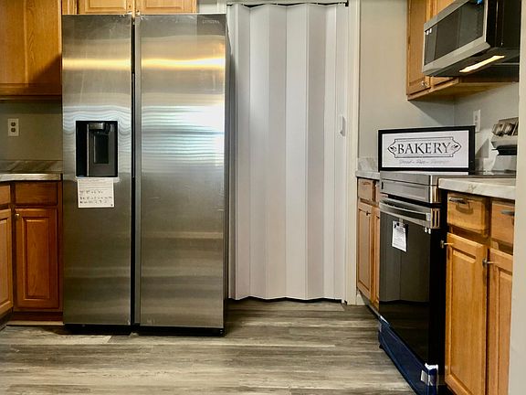 Kitchen view #3 - Laundry room beyond the closet door.