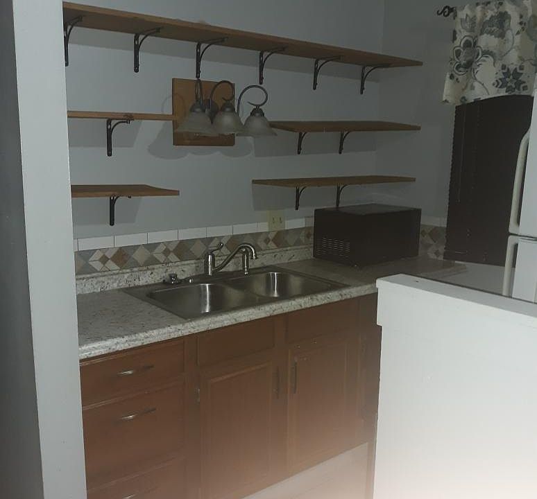 Kitchen with plenty of shelving