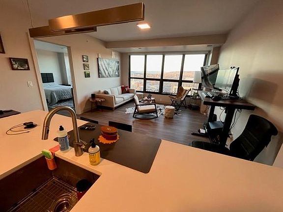 View from Kitchen Island to Livingroom. Beautiful View. **Only Unit for Sublet. Furniture & Furnishings are not included.