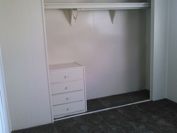 2nd Bedroom with Built In Dresser in Closet