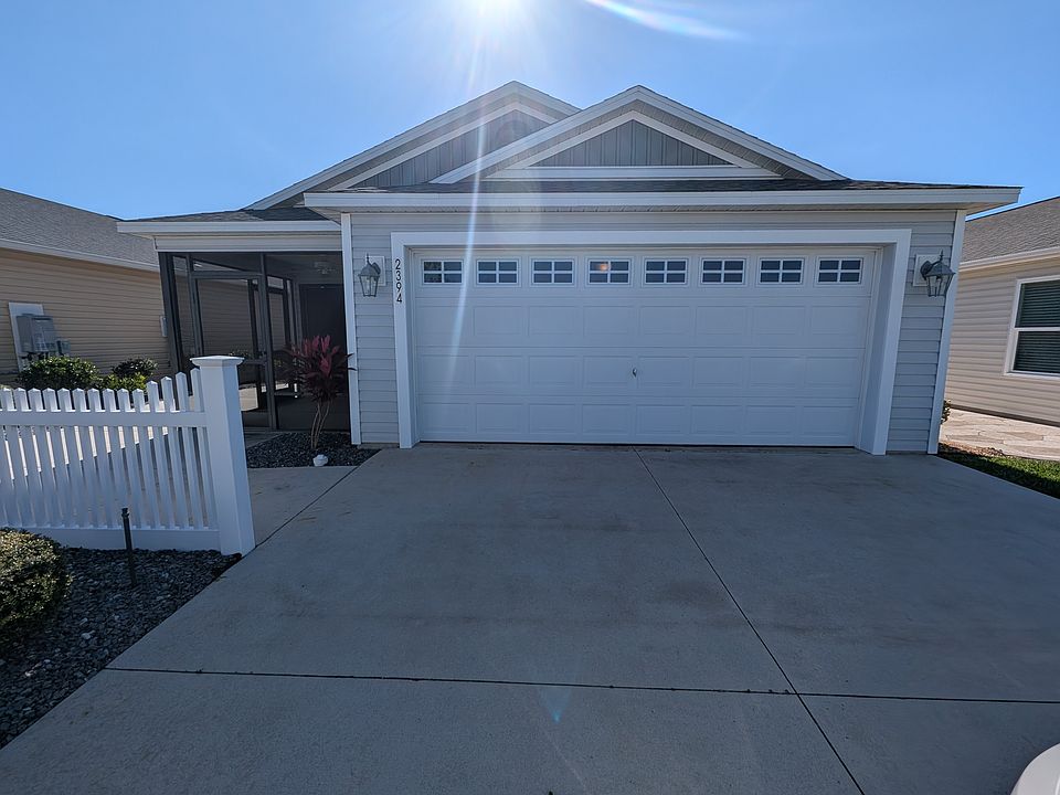 Patio home with 2 car garage. Utility sink in garage.