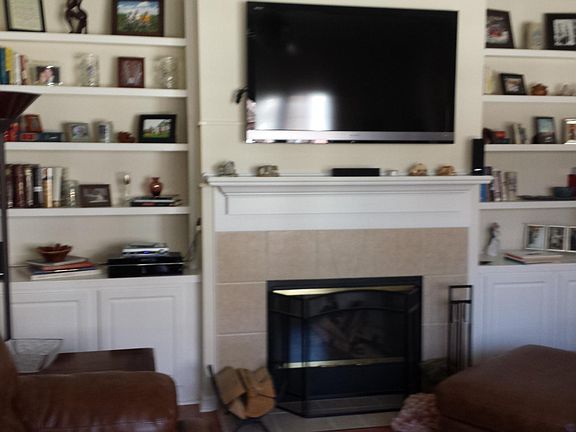 Family Room fire Place and Book shelfs