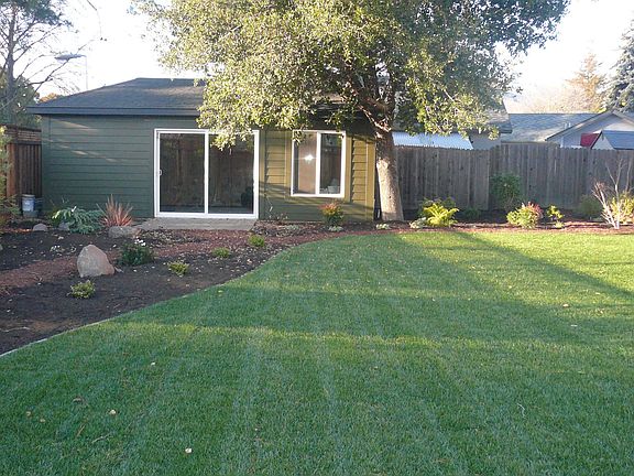 Perfect Back yard with nice storage shed 2/3